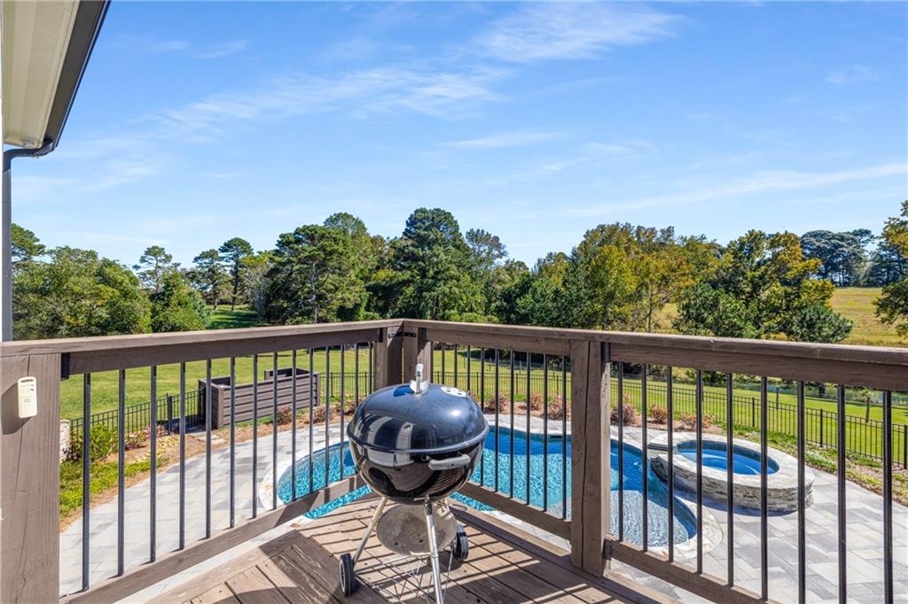 938 Austin Road Winder, GA 30680 - Photo 40 of 50 a view of a balcony with wooden floor and outdoor space