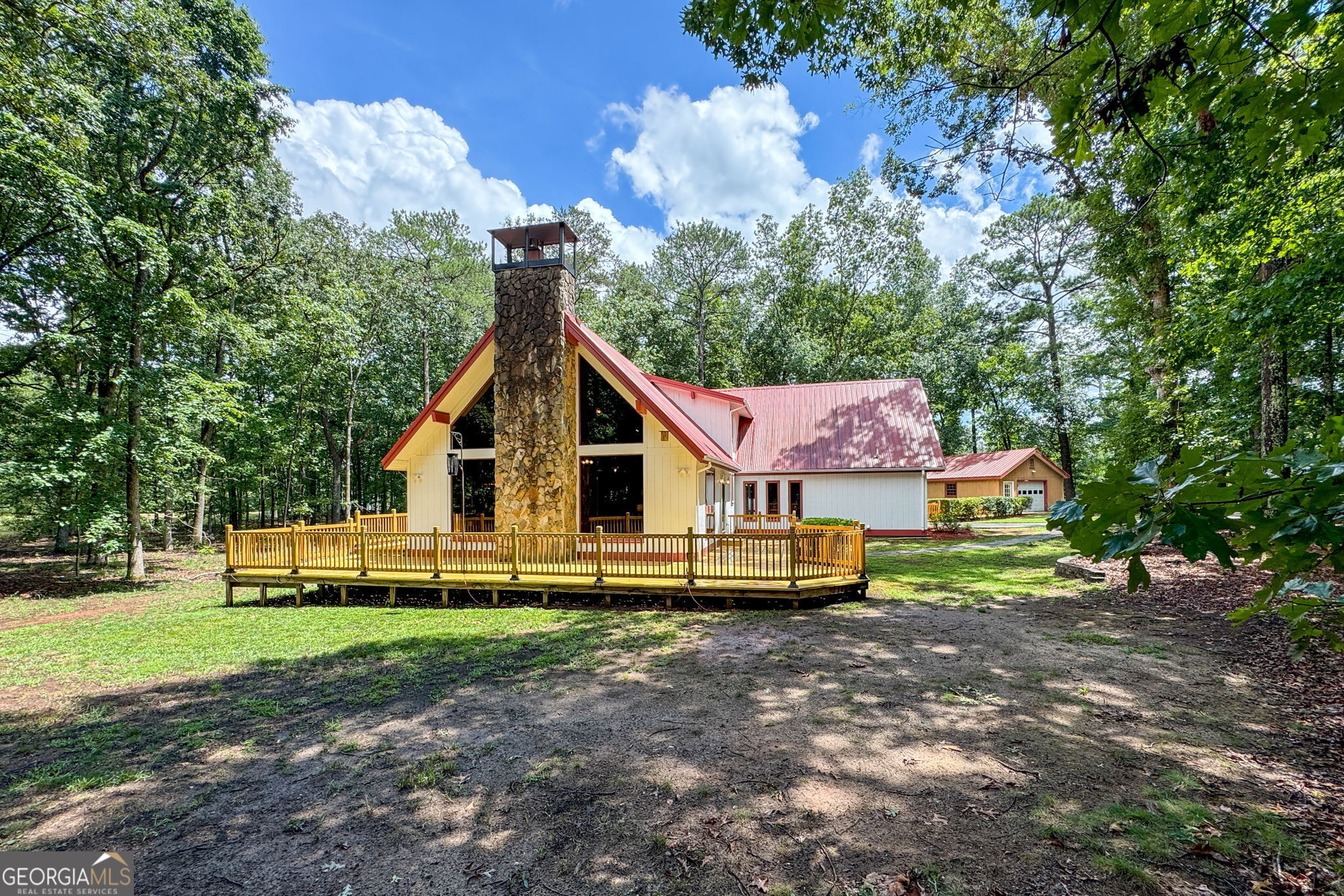 1341 Moreland Road Williamson, GA 30292 - Photo 1 of 1 a view of a house with a yard
