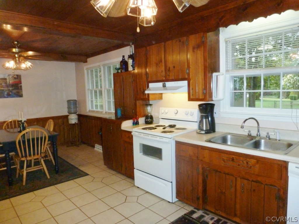 3600 Hemlock Road Chester, VA 23831 - Photo 5 of 24 a kitchen with a sink stove and cabinets