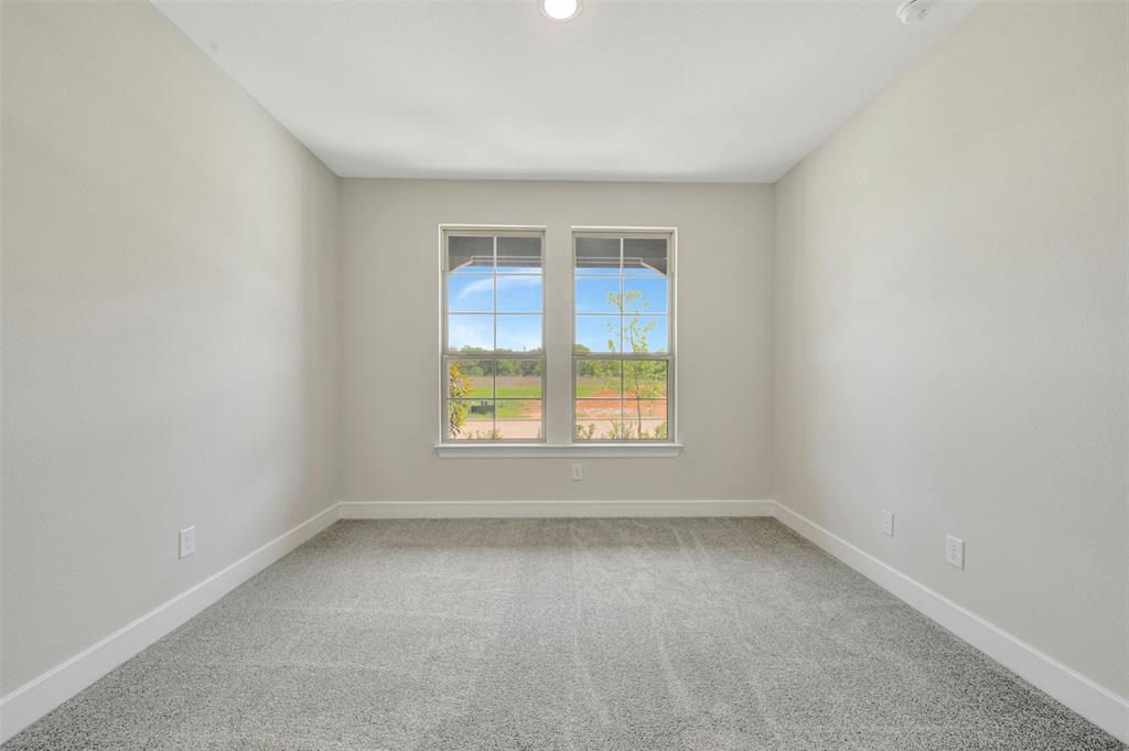 11460 Wulstone Road Fort Worth, TX 76052 - Photo 24 of 40 an empty room with a window