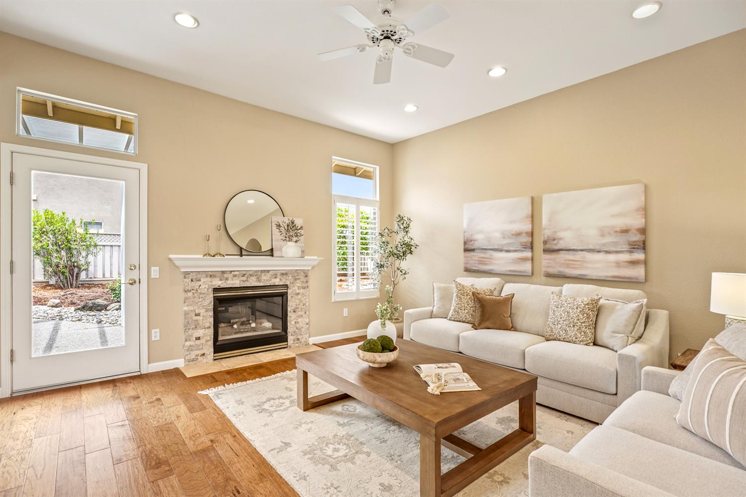 4081 Rose Creek Road Roseville, CA 95747 - Photo 12 of 52 a living room with furniture and a fireplace