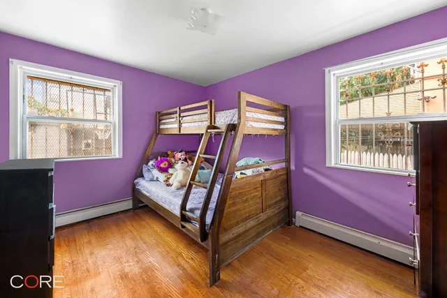 a bathroom with a toilet a sink a mirror a bathtub and shower