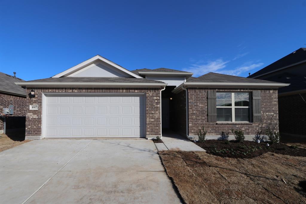 8917 Flying Eagle Lane Fort Worth, TX 76131 - Photo 1 of 1 a front view of a house with yard