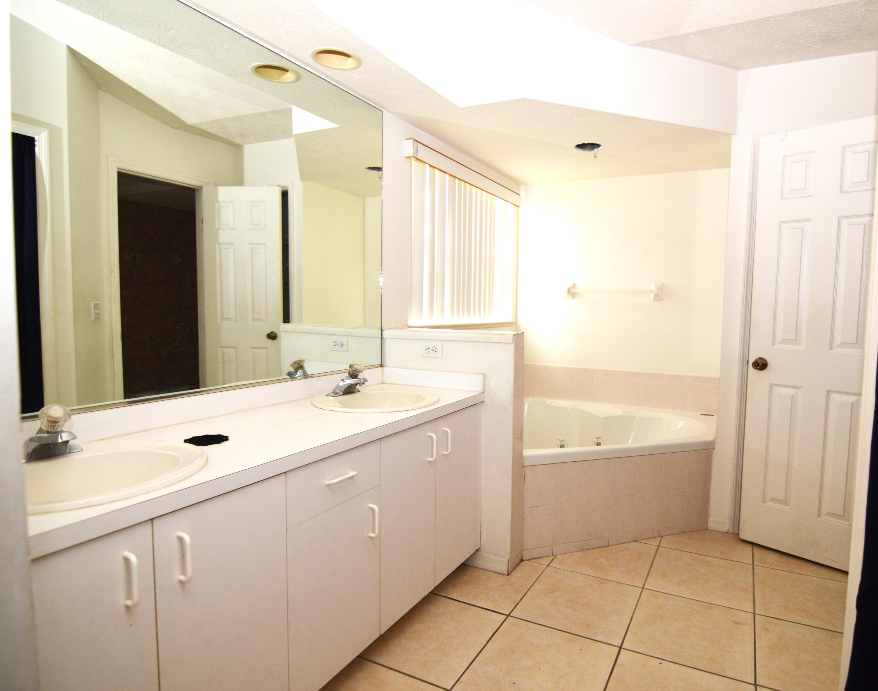 305 Southwest Duxbury Avenue Port St. Lucie, FL 34983 - Photo 10 of 10 master bath