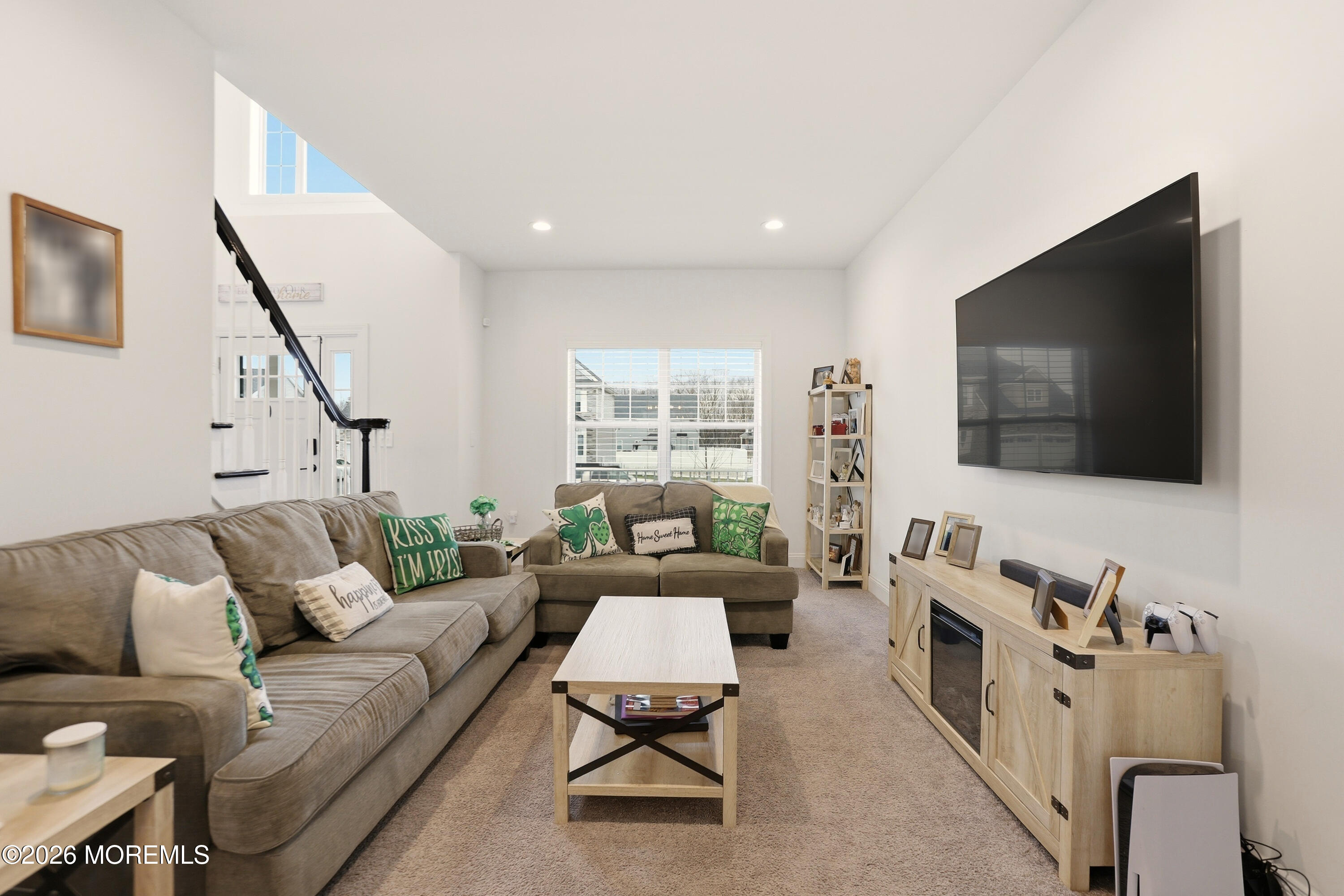 4 Tasha Lane Howell, NJ 07731 - Photo 11 of 55 a living room with furniture and a flat screen tv