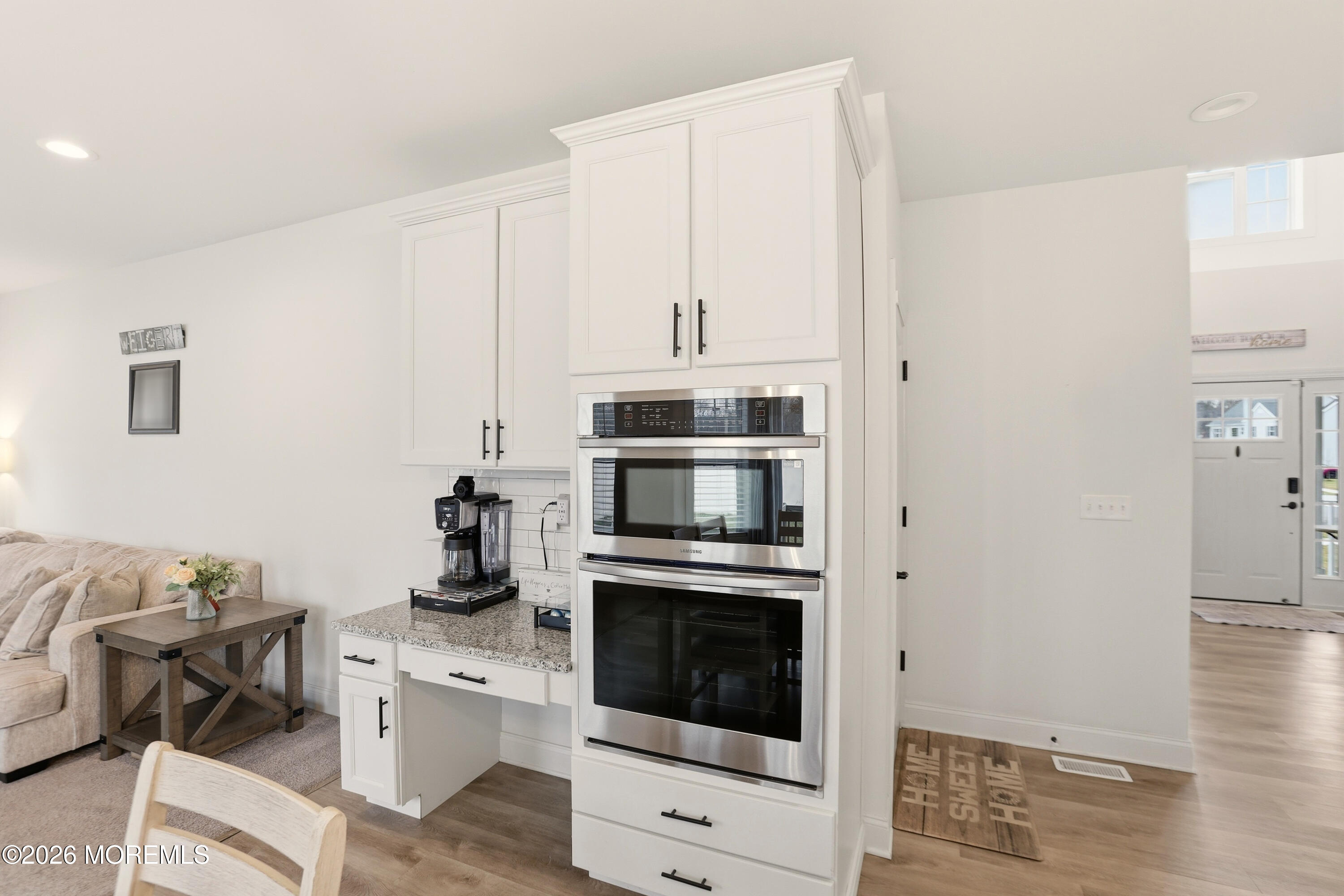 4 Tasha Lane Howell, NJ 07731 - Photo 18 of 55 a kitchen with stainless steel appliances a stove a microwave and a refrigerator