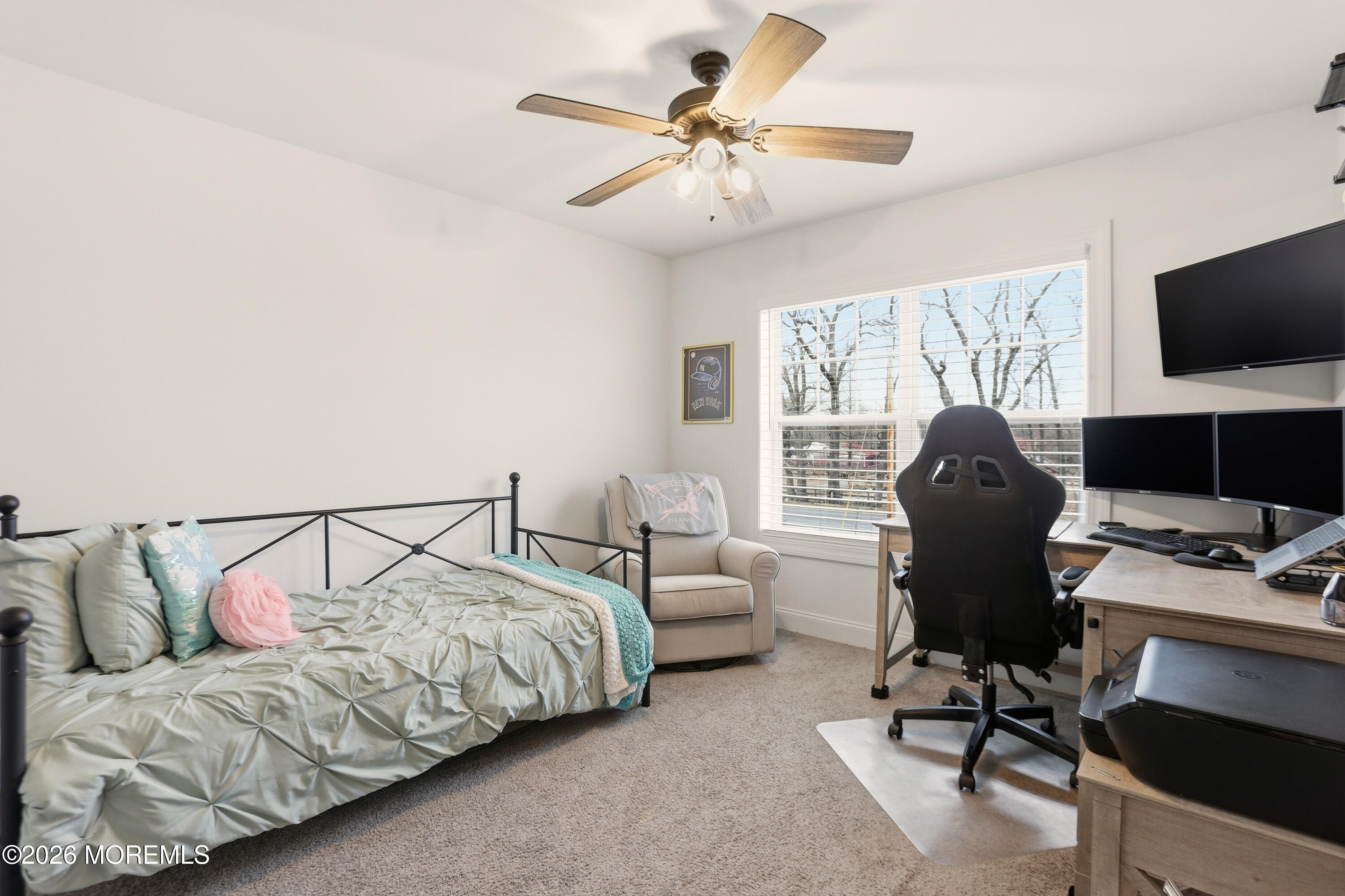 4 Tasha Lane Howell, NJ 07731 - Photo 25 of 55 a bedroom with a bed and a chair