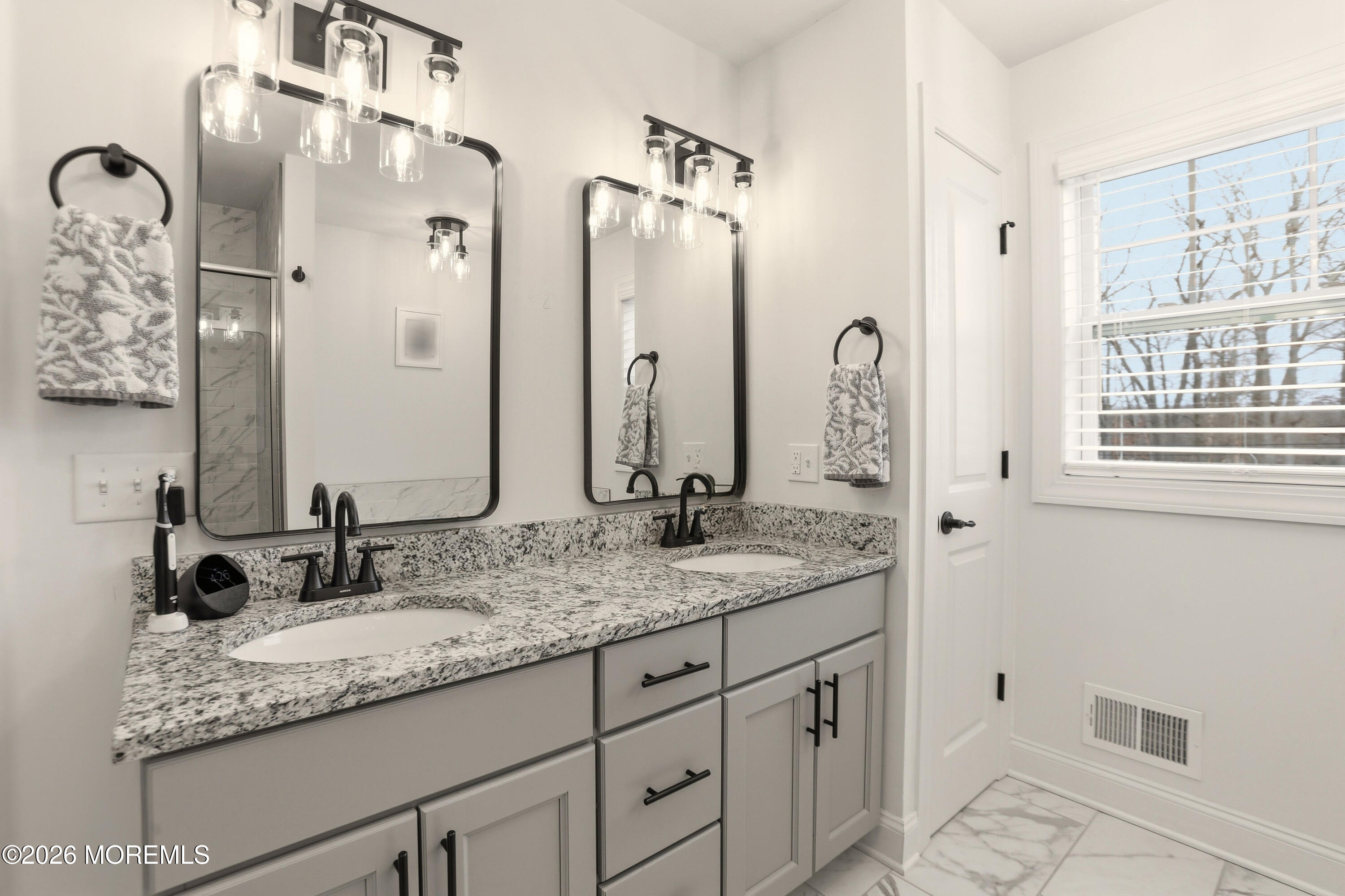 4 Tasha Lane Howell, NJ 07731 - Photo 32 of 55 a bathroom with a granite countertop sink and a mirror