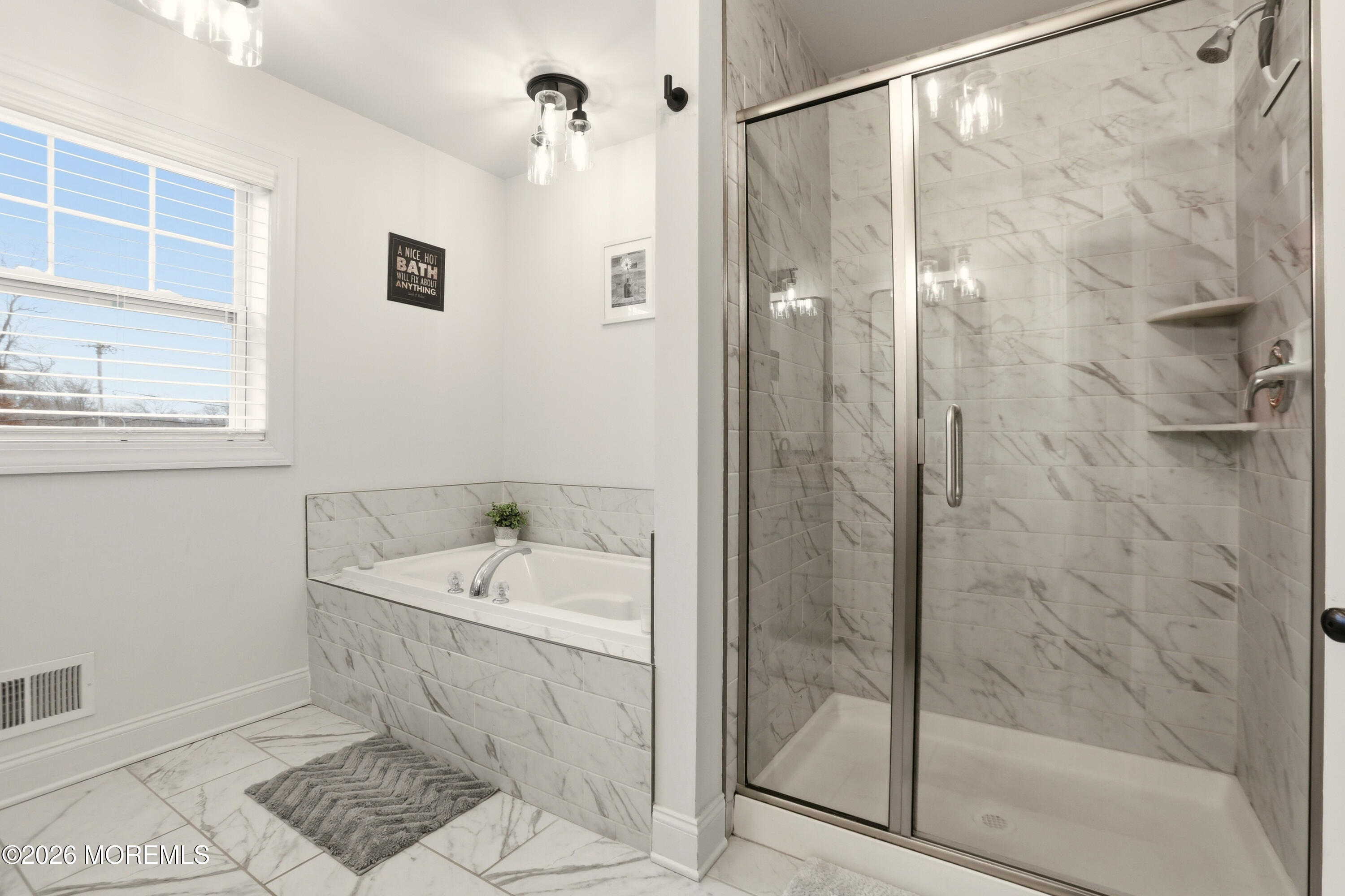 4 Tasha Lane Howell, NJ 07731 - Photo 35 of 55 a white bath tub sitting next to a white sink and a shower