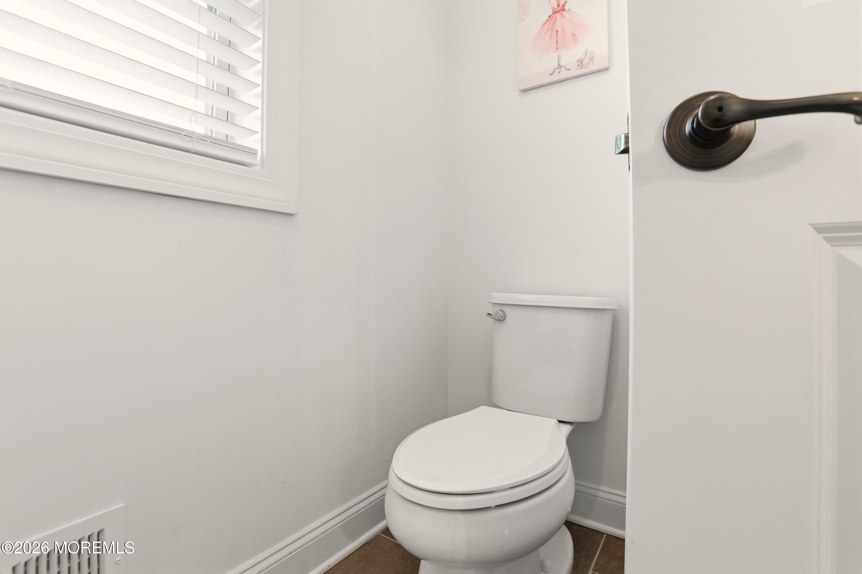 4 Tasha Lane Howell, NJ 07731 - Photo 36 of 55 a white toilet sitting next to a shower