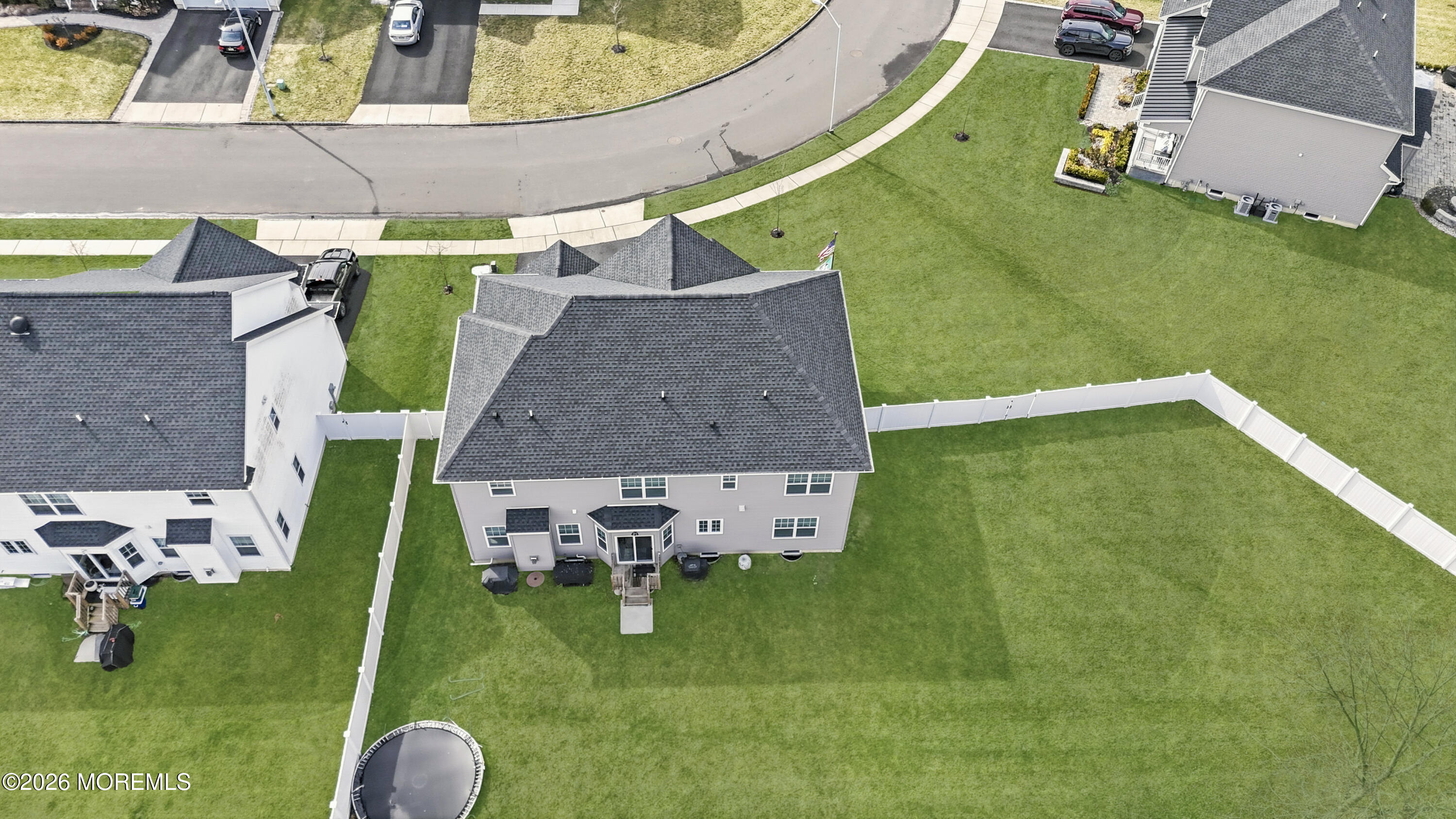 4 Tasha Lane Howell, NJ 07731 - Photo 43 of 55 an aerial view of a house with a garden and swimming pool