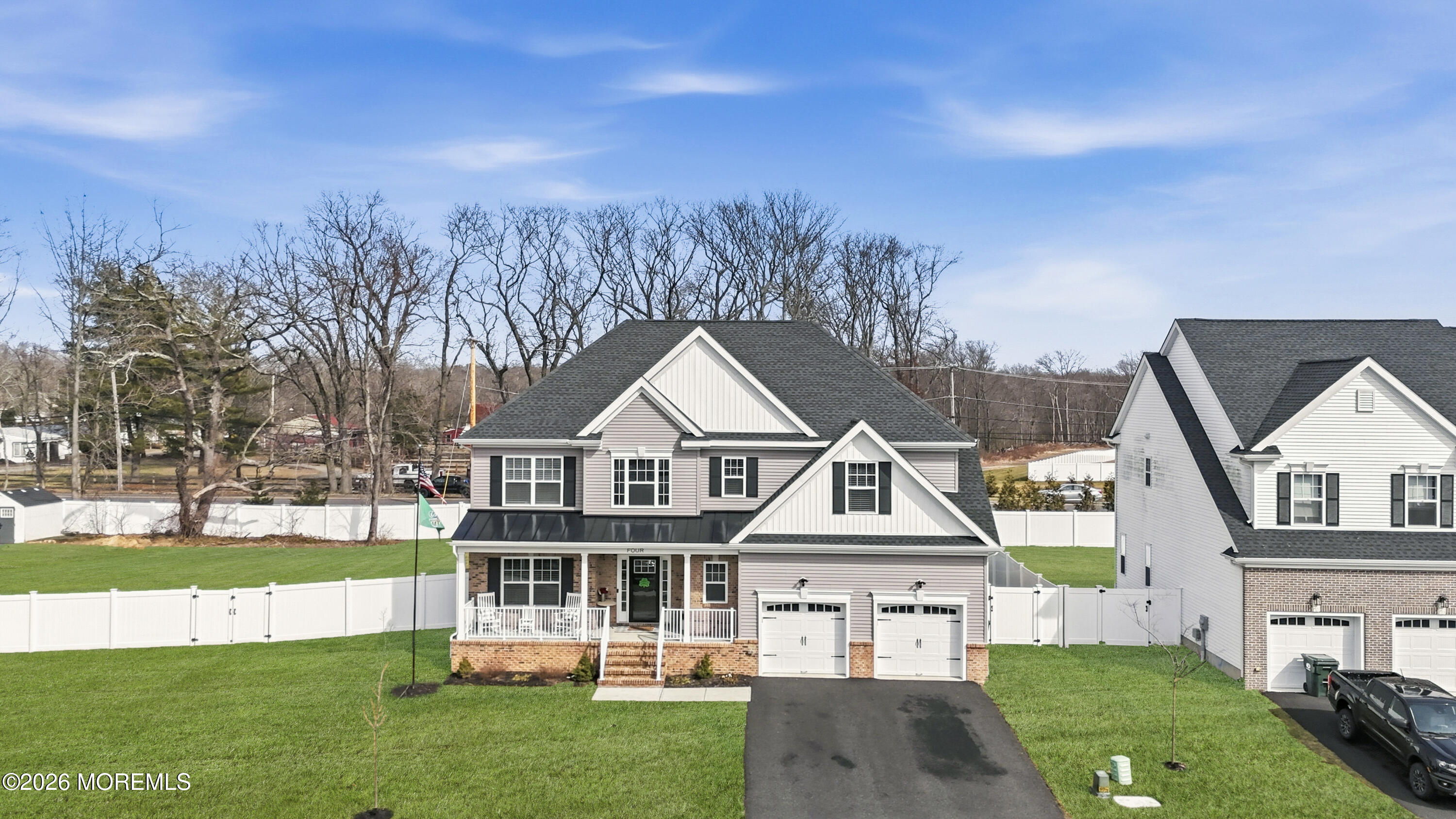 4 Tasha Lane Howell, NJ 07731 - Photo 45 of 55 a front view of a house with a yard