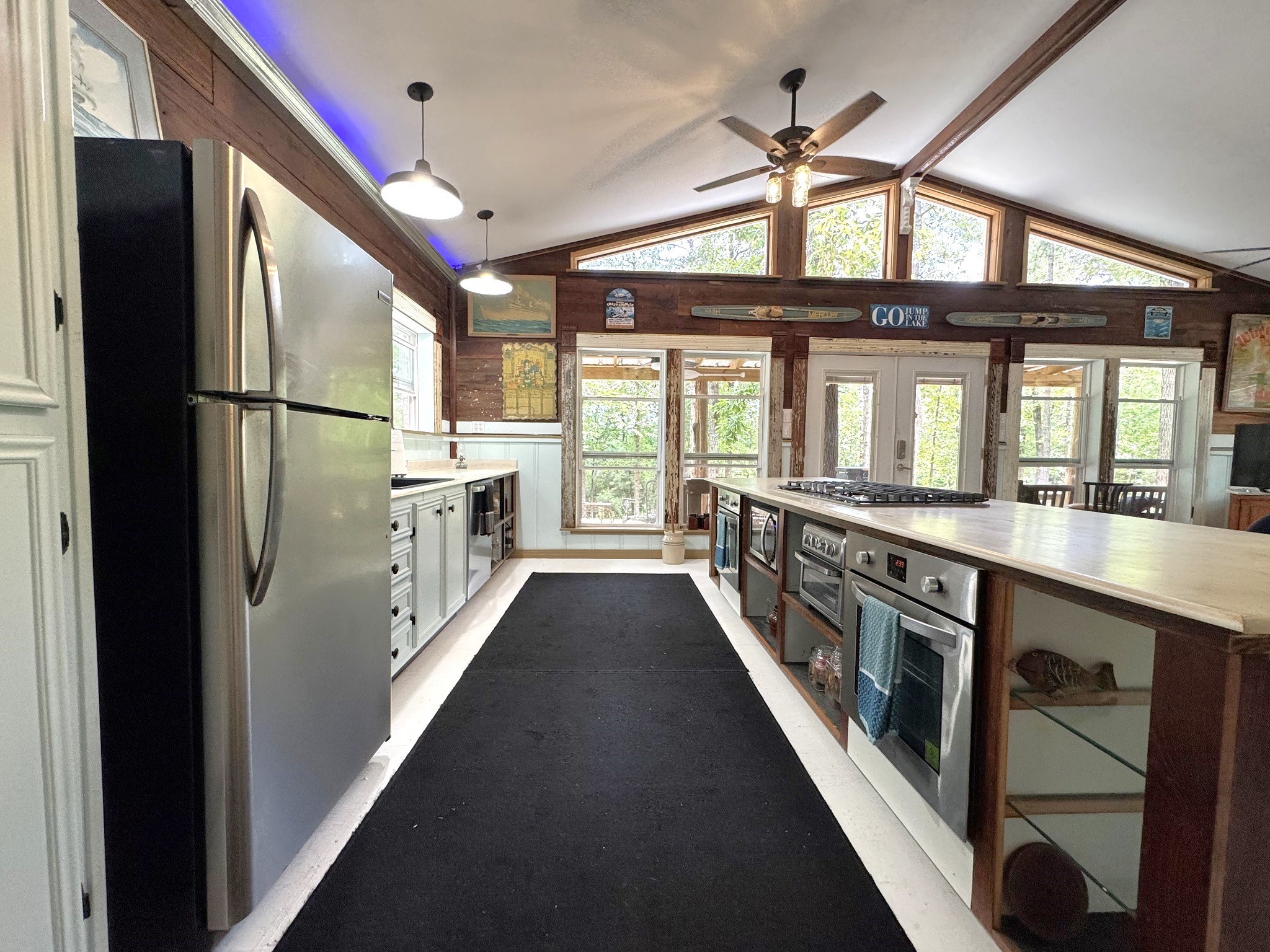 331 County Road 3240 Colmesneil, TX 75938 - Photo 15 of 50 a view of a kitchen with a large window