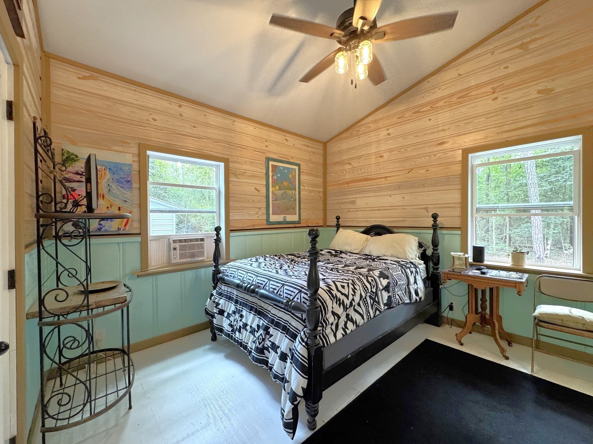 331 County Road 3240 Colmesneil, TX 75938 - Photo 19 of 50 a bed room with a bed and a window