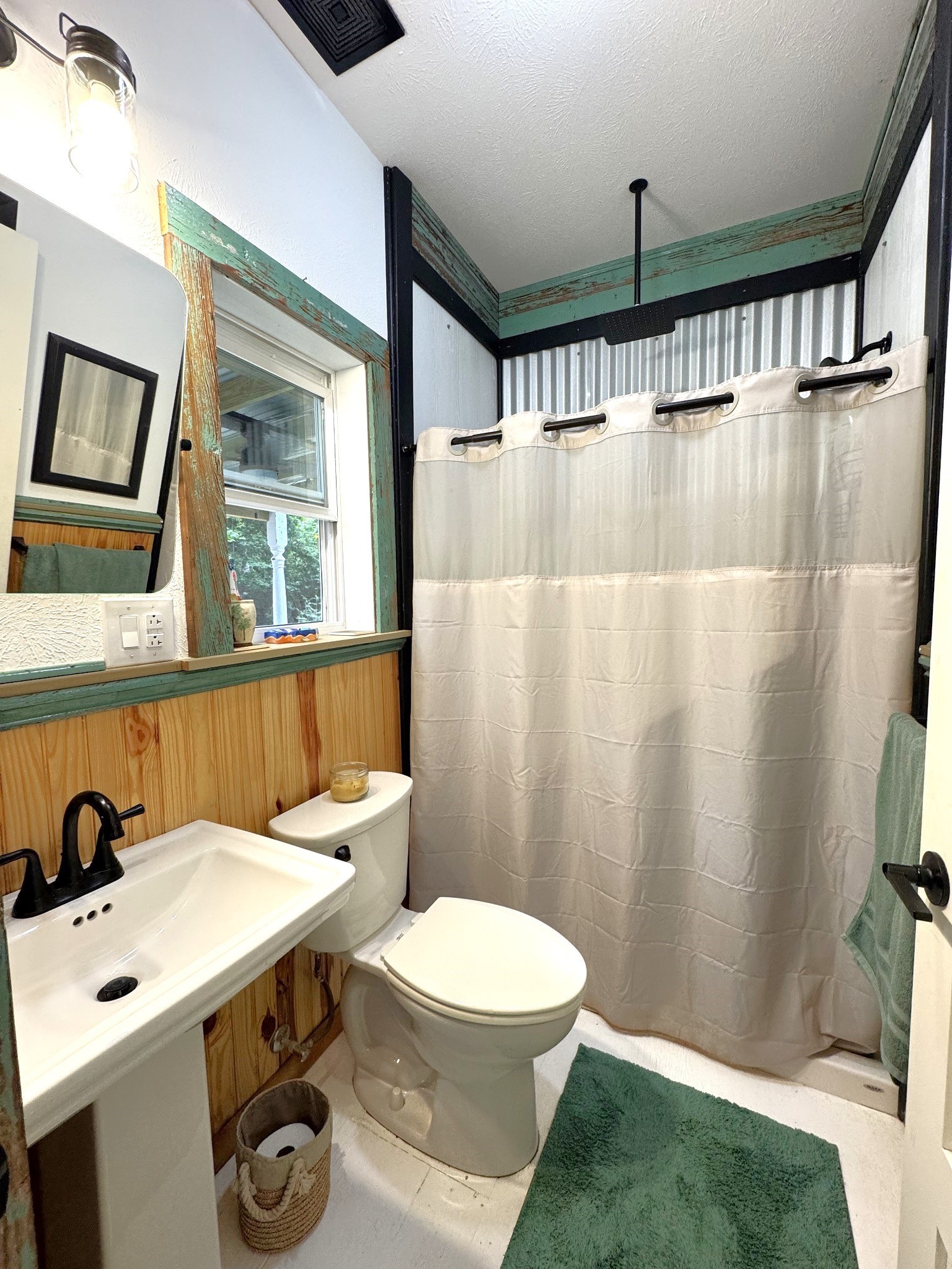 331 County Road 3240 Colmesneil, TX 75938 - Photo 20 of 50 a bathroom with a sink a toilet and shower