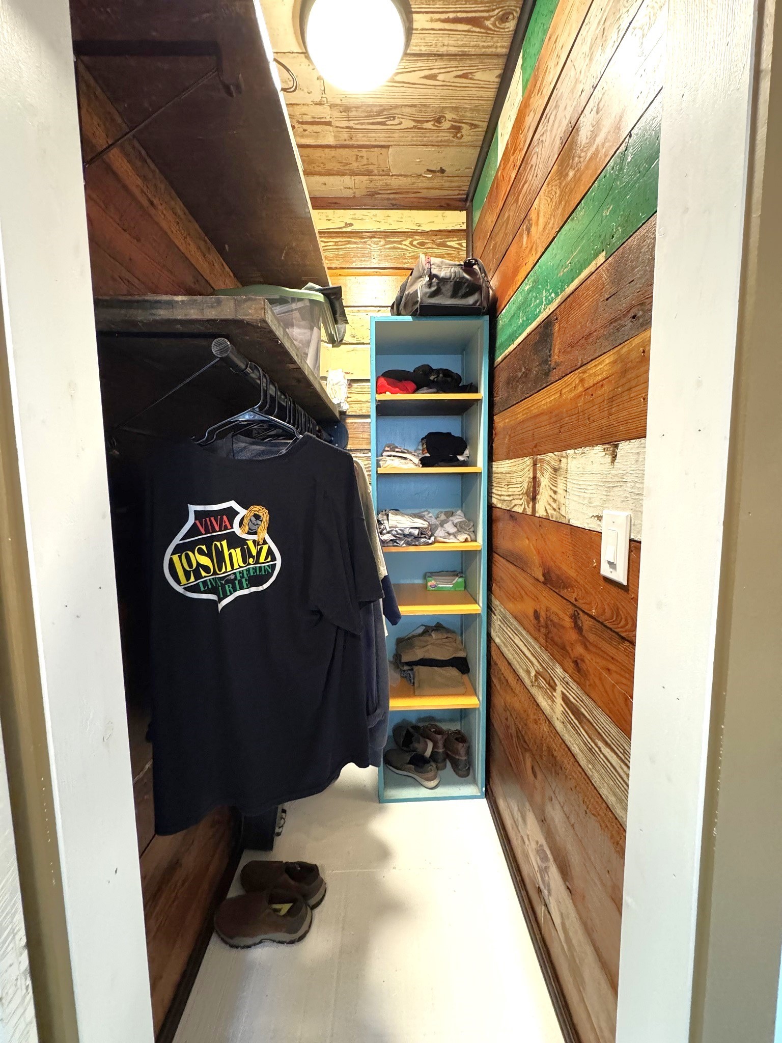 331 County Road 3240 Colmesneil, TX 75938 - Photo 21 of 50 a view of walk in closet with clothes and shoes