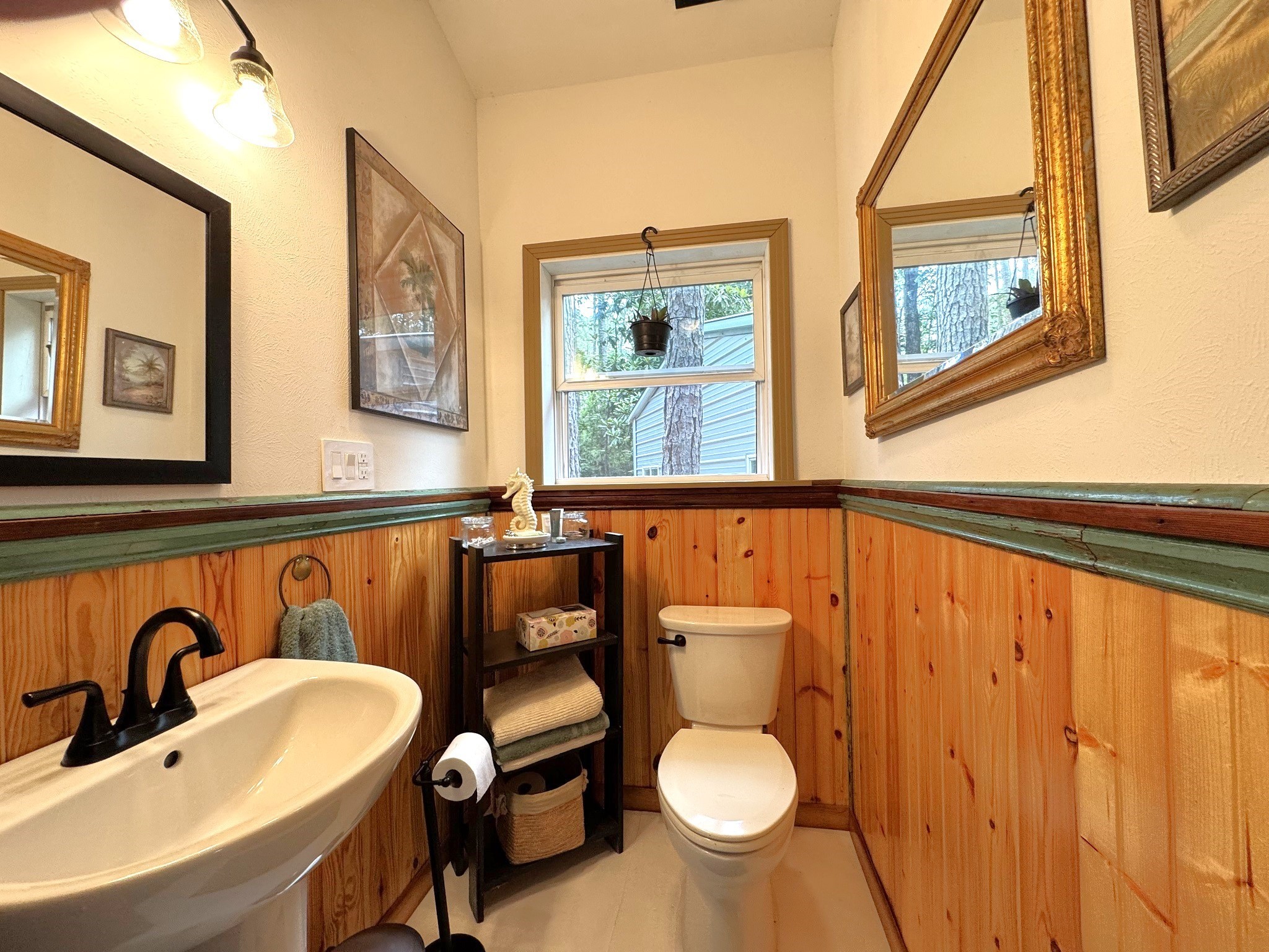 331 County Road 3240 Colmesneil, TX 75938 - Photo 23 of 50 a bathroom with a sink and a mirror