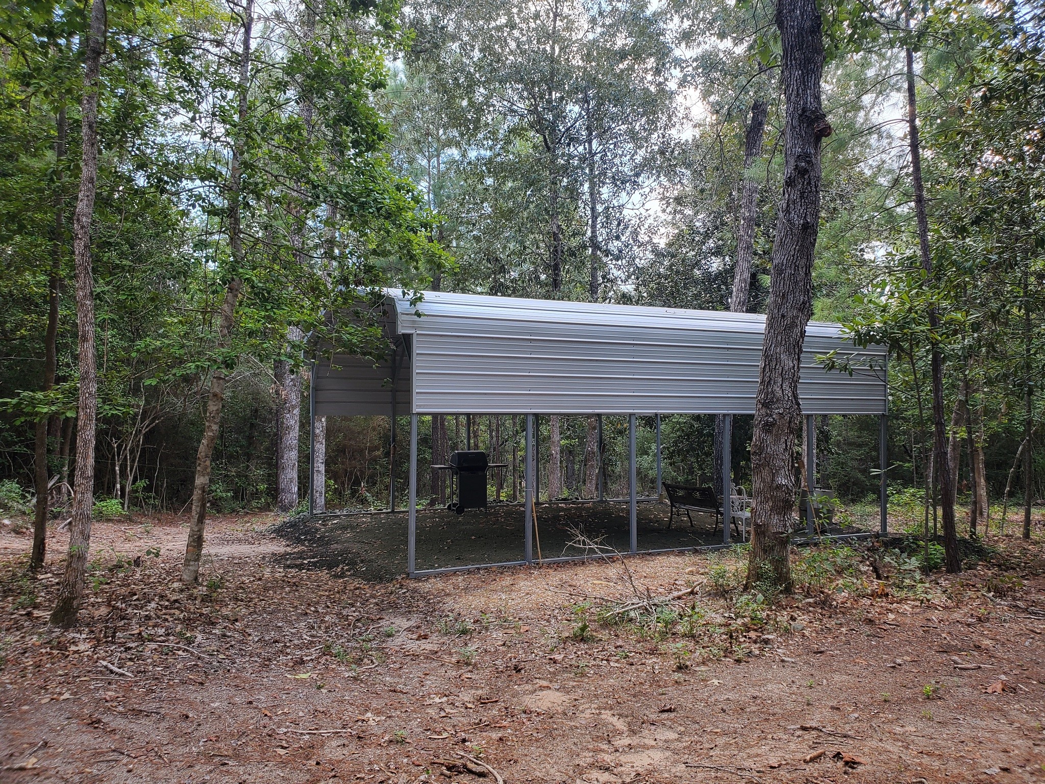 331 County Road 3240 Colmesneil, TX 75938 - Photo 41 of 50 a view of a house with a backyard