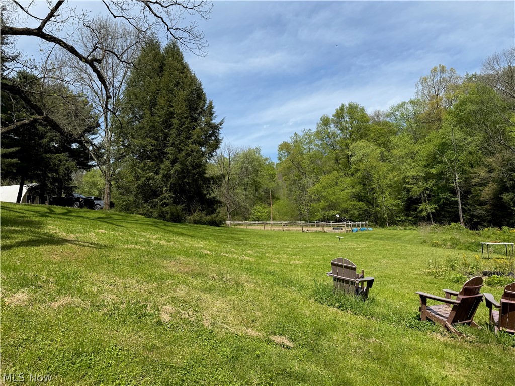 11811 Gaston Road Rogers, OH 44455 - Photo 31 of 38 WELCOME TO PARADISE! 11811 Gaston Rd. Negley/Rogers, OHIO sits on nearly 28 acres of land, with a functional and featured cabin to relax in! Not to mention the Q-Hut that's over 1,000 square feet and has electric, the horse arena is 50x80 and there's plenty of usable space that could be built out for your needs. Schedule your appointment today!