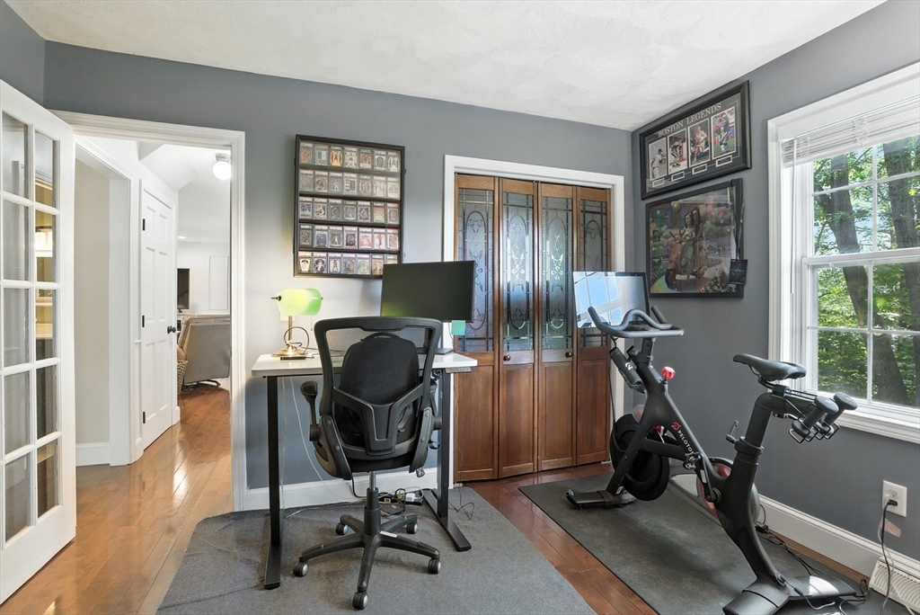 22 Dean Street Hudson, MA 01749 - Photo 14 of 30 a view of a workspace with furniture and a window