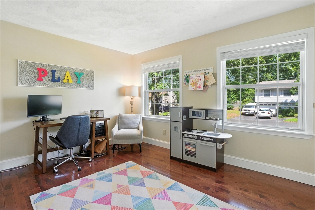 22 Dean Street Hudson, MA 01749 - Photo 15 of 30 a workspace with furniture and a window