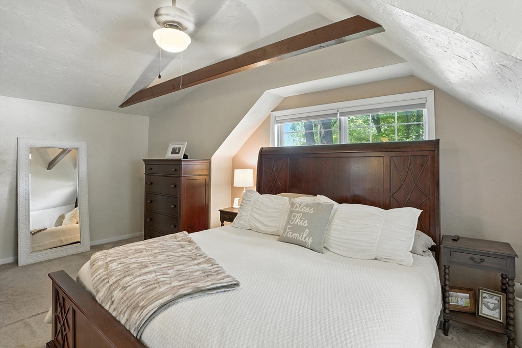 22 Dean Street Hudson, MA 01749 - Photo 16 of 30 a bedroom with a bed and window