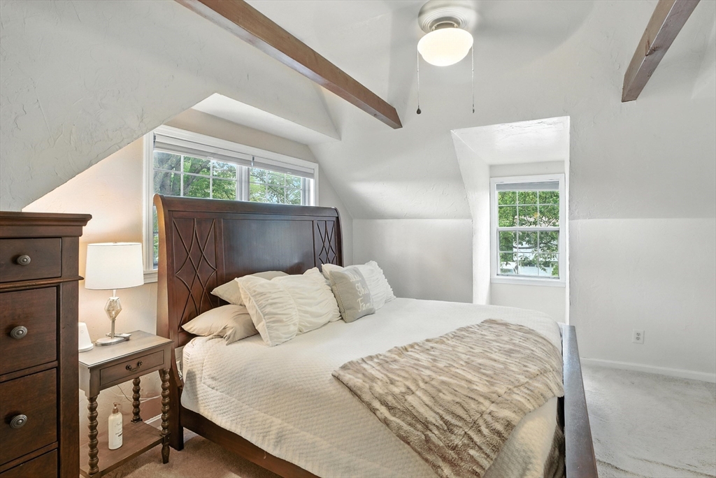 22 Dean Street Hudson, MA 01749 - Photo 17 of 30 a bedroom with a bed and a window