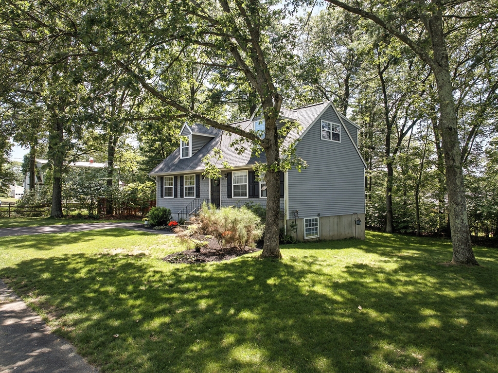 22 Dean Street Hudson, MA 01749 - Photo 2 of 30 a view of a house with a yard