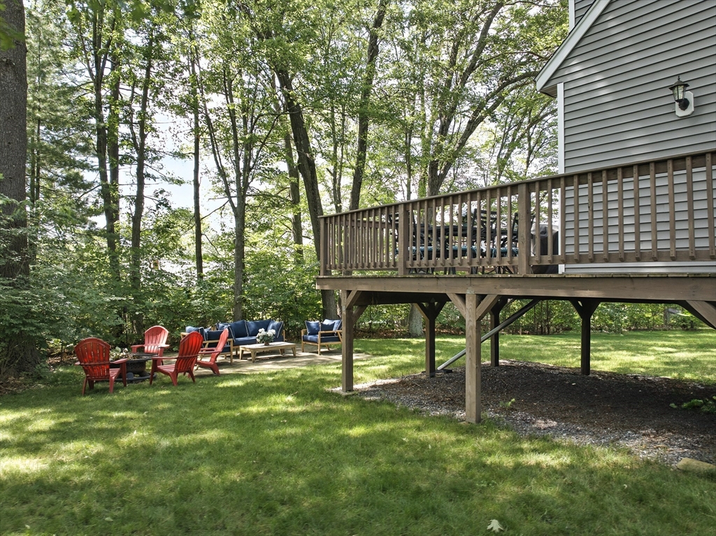22 Dean Street Hudson, MA 01749 - Photo 27 of 30 a view of a bench in the garden