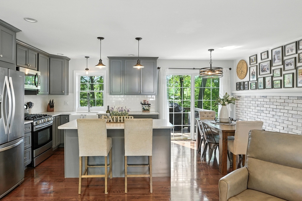 22 Dean Street Hudson, MA 01749 - Photo 7 of 30 a view of a dining room with furniture window and outside view