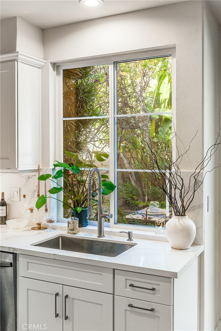 23301 Montecito Place Valencia, CA 91354 - Photo 12 of 41 a sink a window and a sink