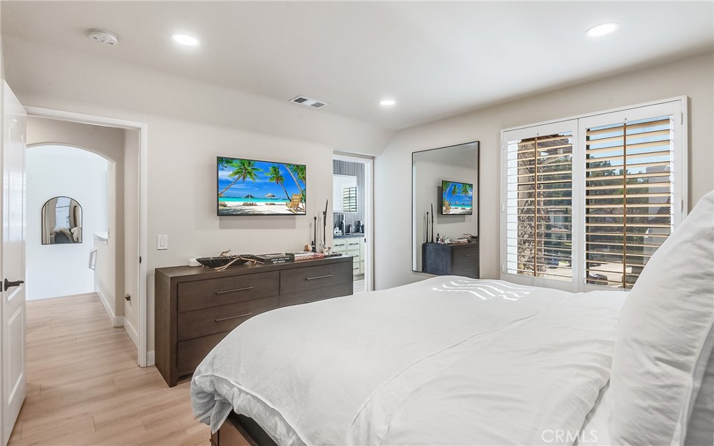 23301 Montecito Place Valencia, CA 91354 - Photo 18 of 41 a bed room with a bed and a television