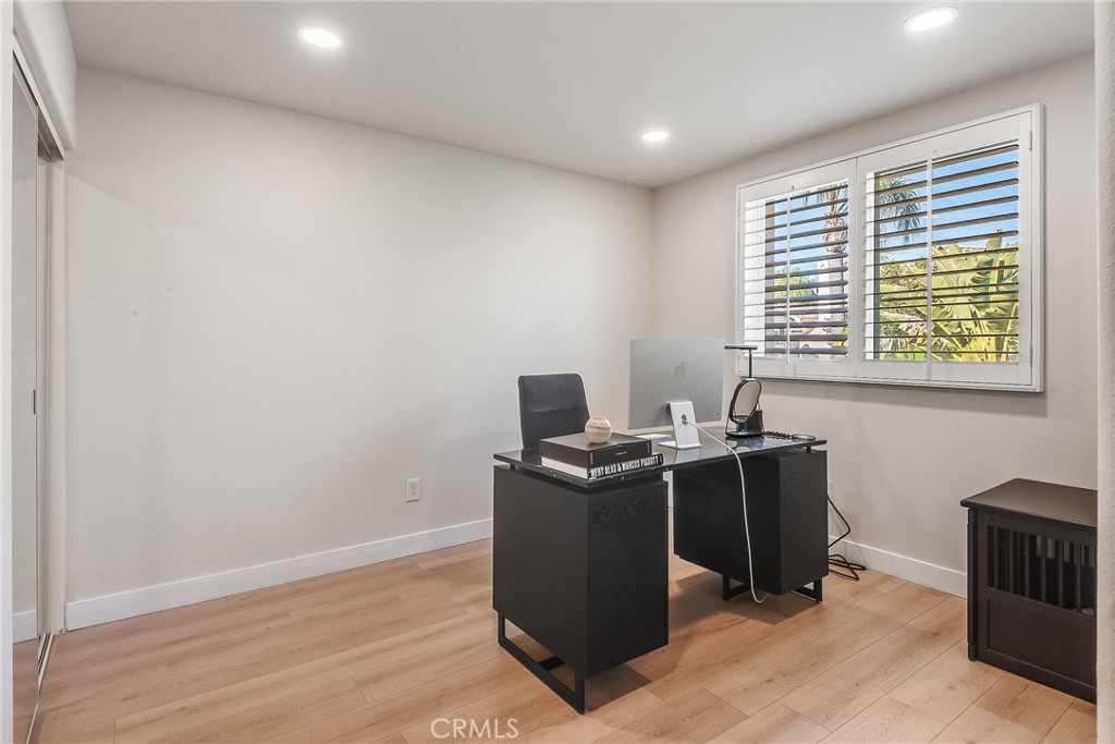 23301 Montecito Place Valencia, CA 91354 - Photo 27 of 41 a view of a workspace with furniture and a window