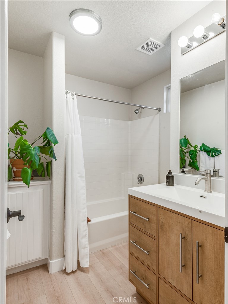 23301 Montecito Place Valencia, CA 91354 - Photo 28 of 41 a bathroom with a sink and a mirror