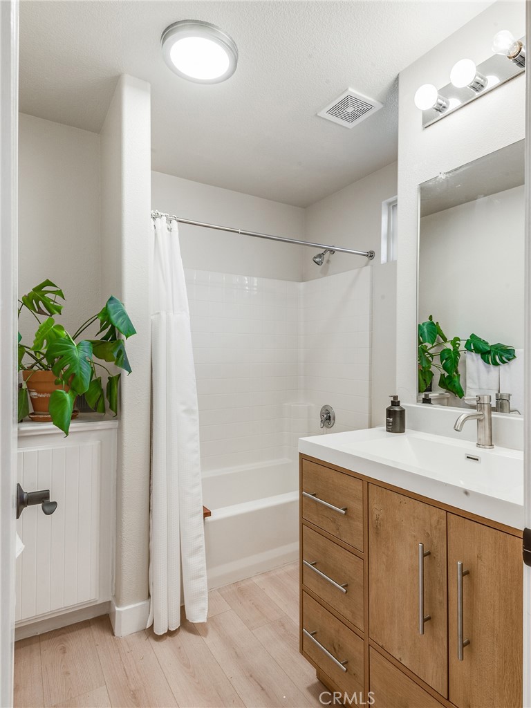 23301 Montecito Place Valencia, CA 91354 - Photo 28 of 41 a bathroom with a sink and a mirror