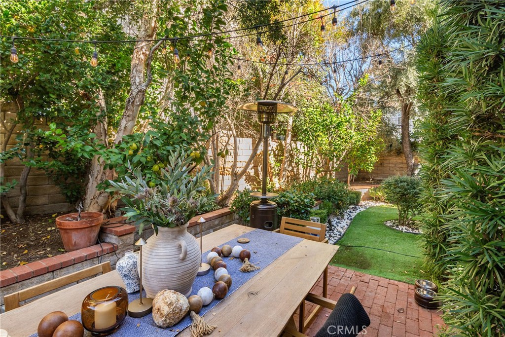 23301 Montecito Place Valencia, CA 91354 - Photo 30 of 41 a view of a porch with furniture and a backyard