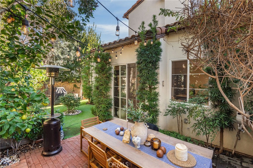 23301 Montecito Place Valencia, CA 91354 - Photo 32 of 41 a backyard of a house with seating space