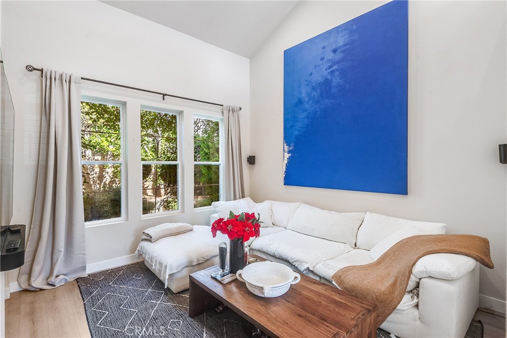 23301 Montecito Place Valencia, CA 91354 - Photo 5 of 41 a living room with furniture and a large window