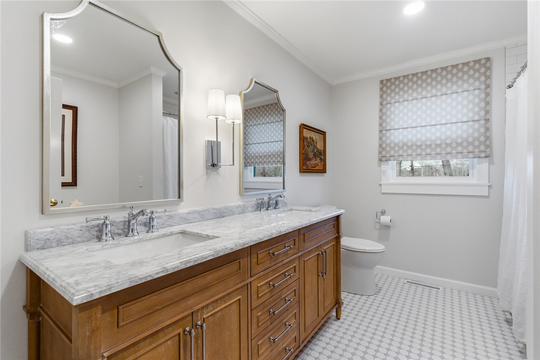106 Cherokee Circle Anderson, SC 29621 - Photo 31 of 45 Dual vanities with elegant marble countertops provide a refined and functional space.