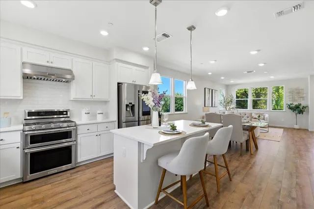 a kitchen with a sink and a window