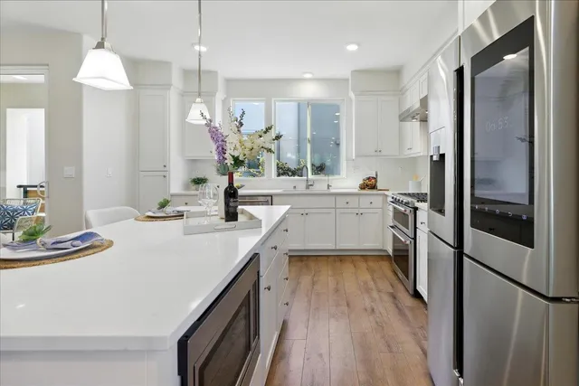 a room with furniture and a wooden floor