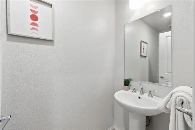 a bed room with a bed and a large window