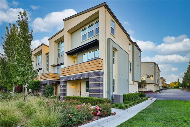 a view of street from balcony