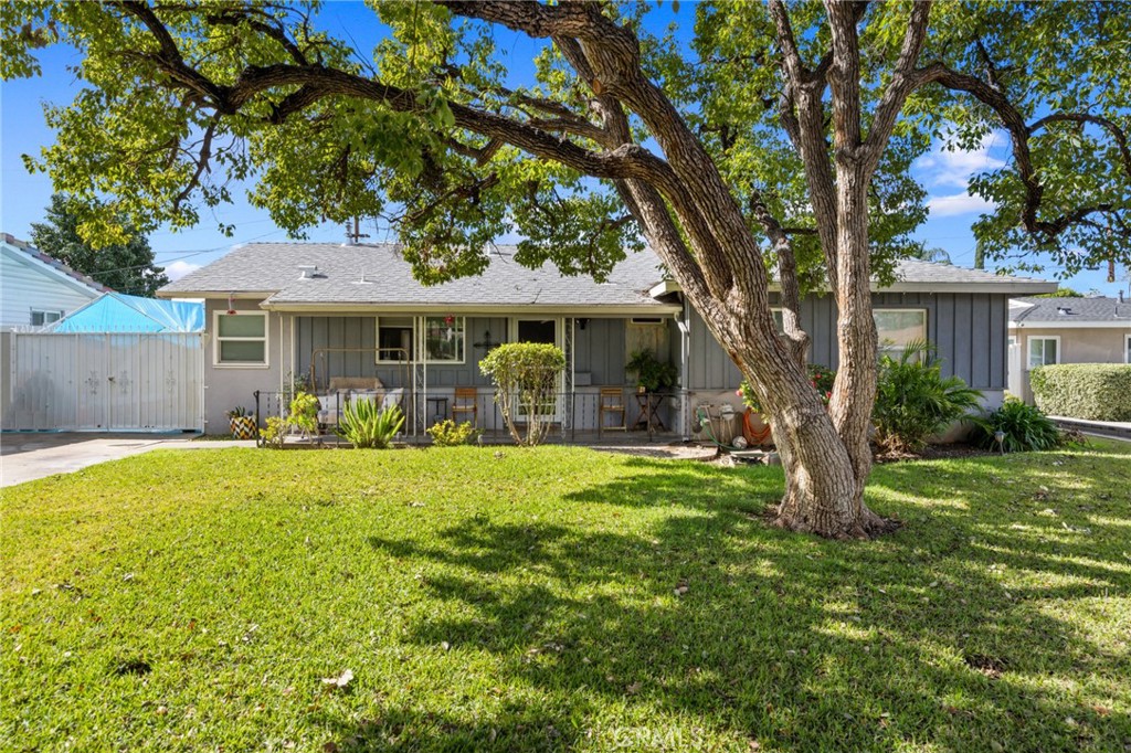 3900 Rockingham Place Riverside, CA 92504 - Photo 1 of 1 a front view of a house with a yard