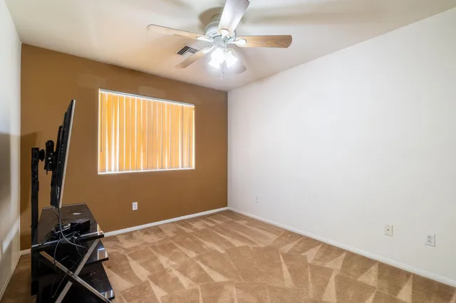 a view of a livingroom with furniture