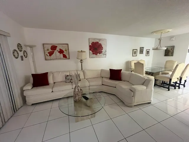 a room with furniture and a flat screen tv