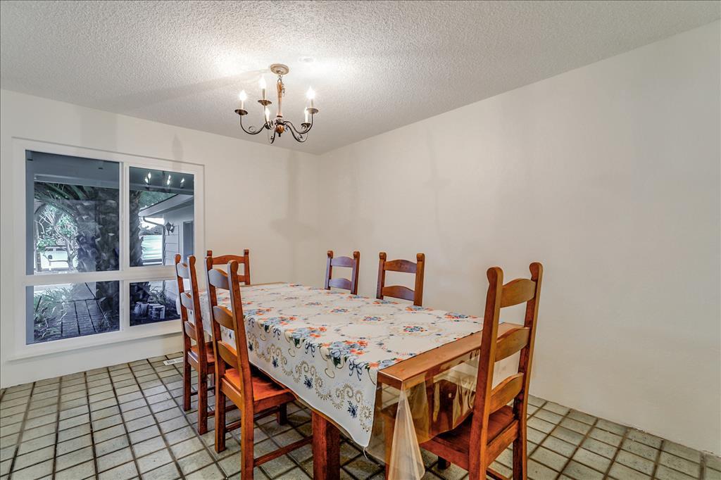 11351 Bubb Road Cupertino, CA 95014 - Photo 11 of 14 a view of a dining room with furniture and window