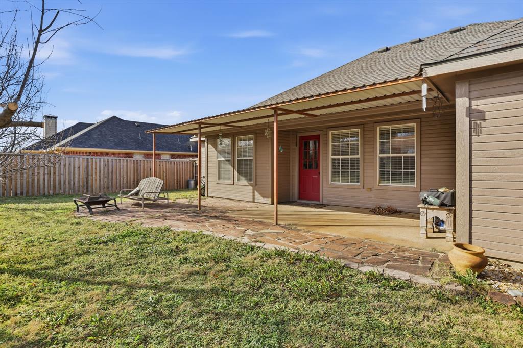 921 Calder Street Howe, TX 75459 - Photo 24 of 25 a view of a house with backyard and sitting area