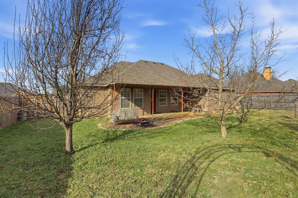 921 Calder Street Howe, TX 75459 - Photo 25 of 25 a backyard of a house with table and chairs