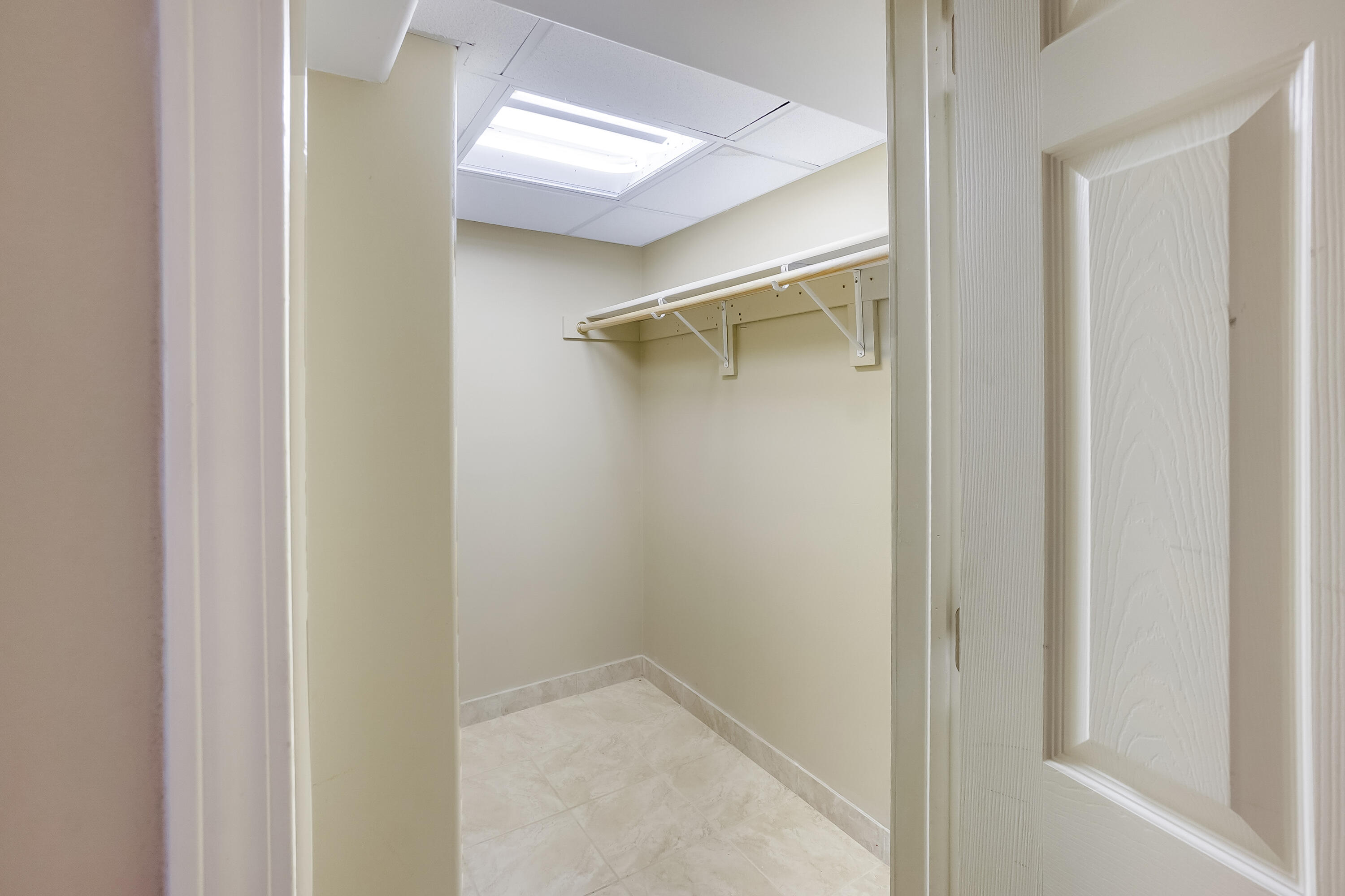 12800 Elmwood Road Elm Grove, WI 53122 - Photo 33 of 41 Lower Walk-in Closet